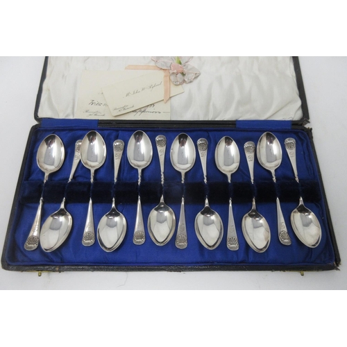 189 - A Set of one dozen George V silver Teaspoons with spiral and shell pattern stems, engraved initial D... 