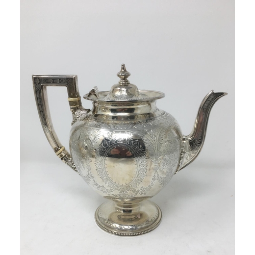 194 - A Victorian silver four piece Tea and Coffee Service with finely detailed floral and leafage engravi... 