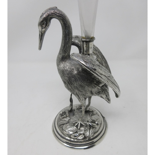 208 - A plated Epergne in the form of a stork on naturalistic leafage circular base, fitted glass trumpet ... 