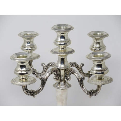 214 - A Greek silver four branch five light Candle Holder on tapering column and circular base