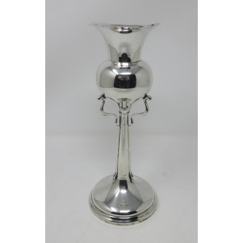 221 - An Edward VII silver Art Nouveau Vase with sinuous supports on circular base, Sheffield 1908.