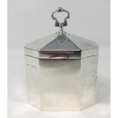 227 - An Edward VII silver octagonal Tea Caddy with hinged cover having ring handle, London 1903