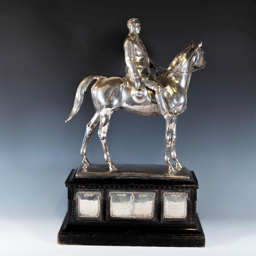 243 - ADRIAN JONES (1845-1938); silver Sculpture of a Hunter and Huntsman, London 1907, maker Hollingshead... 