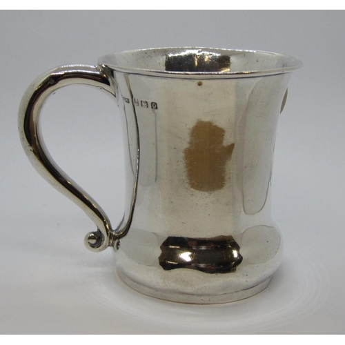 244 - A George V silver Christening Mug of waisted form engraved initials, Birmingham 1913.