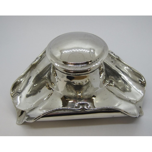 245 - An Edward VII silver Inkwell of scroll rectangular form, Birmingham 1908.