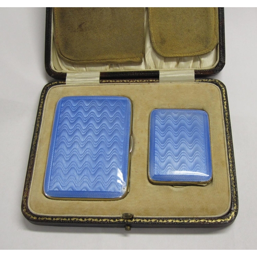 251 - A George V silver and pale blue guilloche enamel Cigarette Case and Matchbox Holder, Birmingham 1929... 