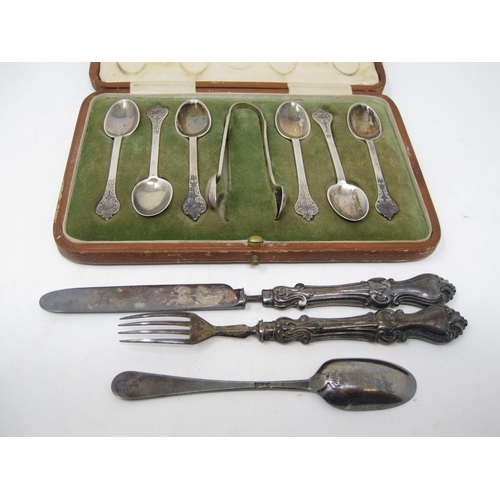 258 - Six George V silver Coffee Spoons and Sugar Tongs with decorated trefid stems, Sheffield 1910, in ca... 