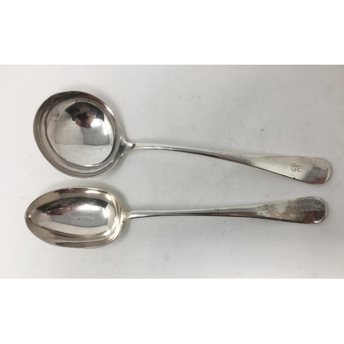 259 - A George V silver Soup Ladle and large Basting Spoon, hanoverian pattern engraved initial, Sheffield... 