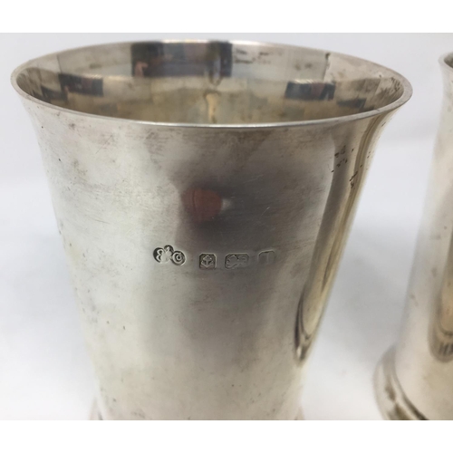 261 - A pair of George V silver Beakers with inscriptions, Birmingham 1910 and 1914, 278 gms.