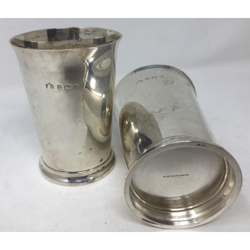 261 - A pair of George V silver Beakers with inscriptions, Birmingham 1910 and 1914, 278 gms.