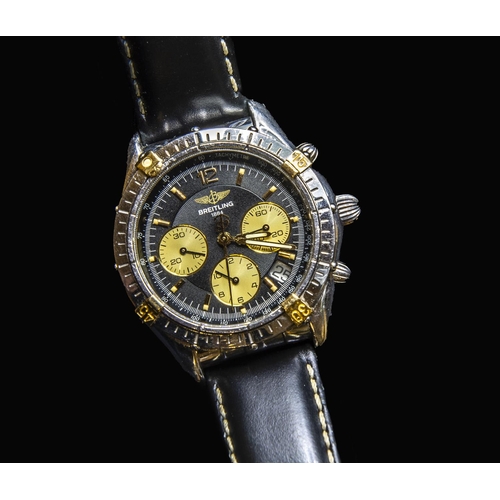 283 - A Gentleman's Breitling Automatic Chronometer Wristwatch, the black dial with hourly applied gold ma... 