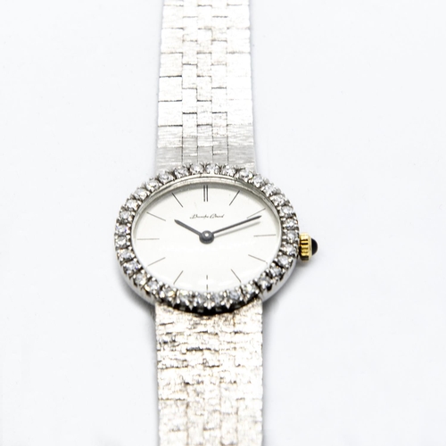 286 - A lady's Bueche Girod Cocktail Watch, the circular silvered dial with black hourly baton markers and... 