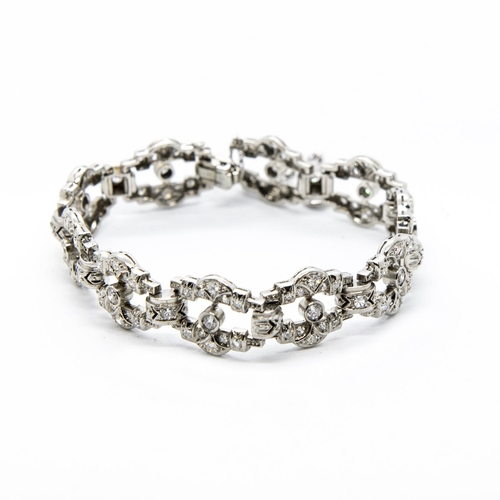 368 - An Art Deco style Diamond Bracelet, having ten openwork links millegrain-set throughout brilliant an... 