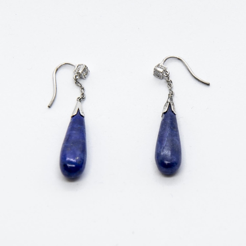 379 - A pair of Diamond and Lapis Lazuli Ear Pendants, each pavé-set, single brilliant-cut diamond suspend... 