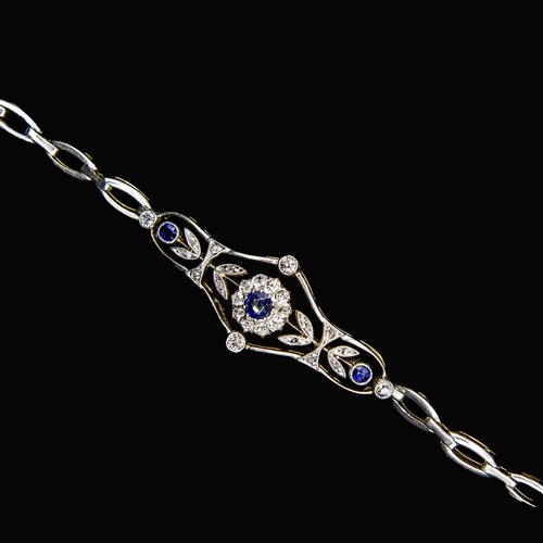 400 - An Edwardian Sapphire and Diamond Bracelet, the front having fine openwork plaque claw-set round sap... 