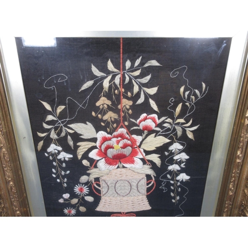 541 - A large gilt framed silk work Picture of a hanging basket of flowers, 18 x 15in