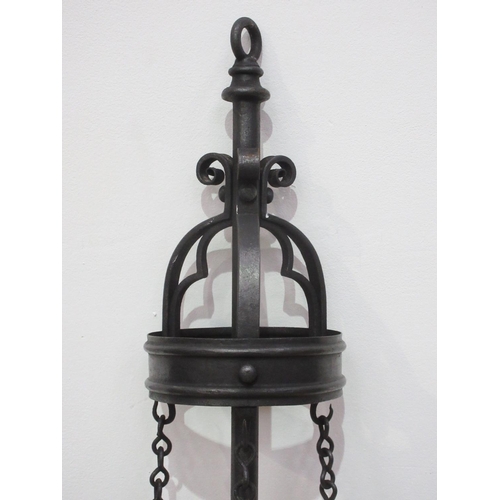 577 - A wrought iron church Ceiling Light with three brass sconces, 5ft 5in H