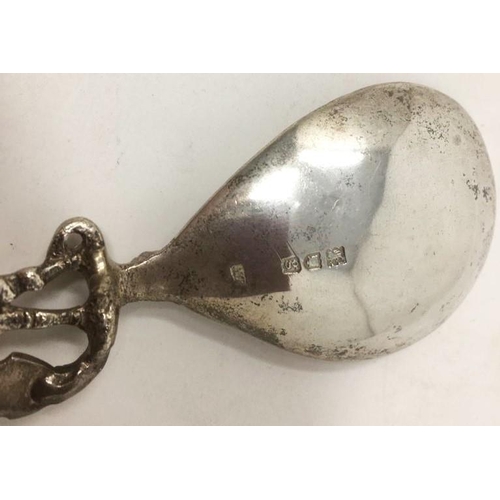 173 - A George IV silver Caddy Spoon fiddle pattern with leafage engraved bowl, Birmingham 1824. Maker: J.... 