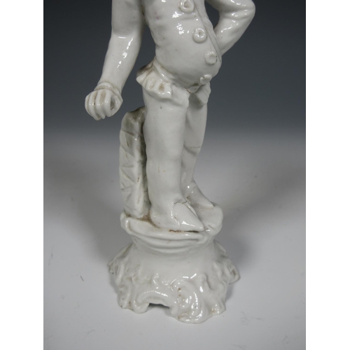 495 - A blanc de chine Italian figure of Punchinello striking a pose with stone plinth and rococo style ba... 