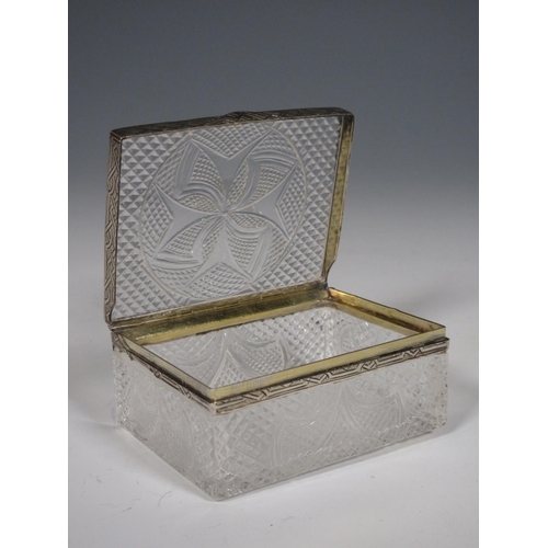 501 - A Continental cut glass lidded Box with silver mount.