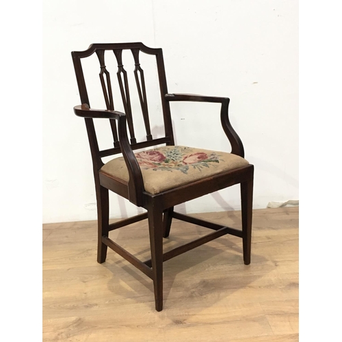 791 - A 19th Century mahogany Elbow Chair with wheatsheaf back and rose decorated needlepoint seat