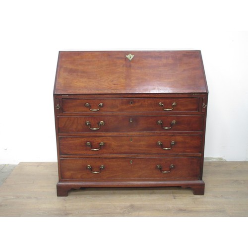 781 - A Georgian mahogany Bureau, fitted interior with drawers and three long drawers under having mahogan... 