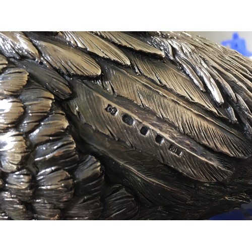 178 - A silver model of a cock Pheasant by Tom Mackie dated '03 (beak slightly damaged) 1ft 7in L