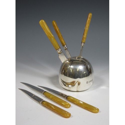 123 - An Elizabeth II silver model of an apple, Edinburgh 1953, with six plated Fruit Knives.