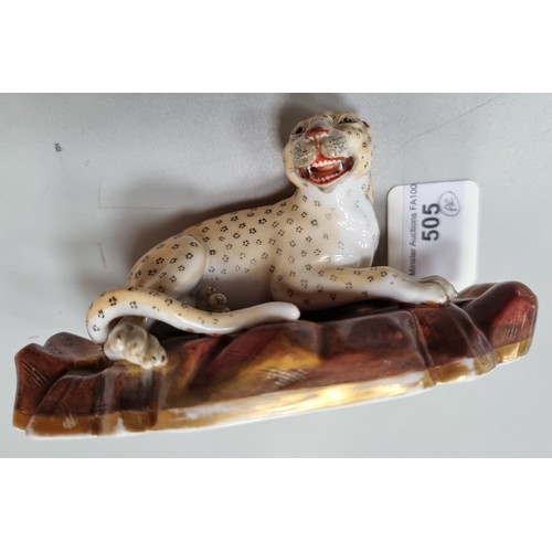 505 - A rare pair of Rockingham Leopards, single male on rocky base with painted detail and mother with th... 