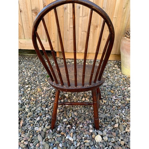 89 - A 19th Century American hoopback child's Chair on simulated bamboo supports, bearing label to unders... 