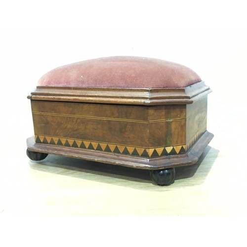 148 - A Victorian octagonal walnut veneered Box Stool with red cushioned top above sides decorated with bo... 