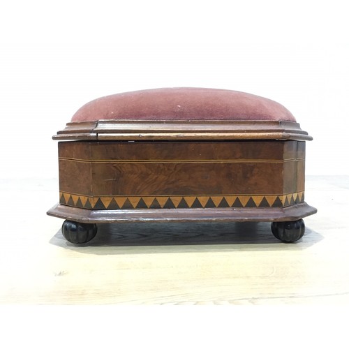 148 - A Victorian octagonal walnut veneered Box Stool with red cushioned top above sides decorated with bo... 