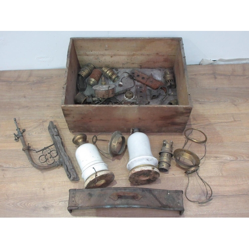 435 - A box containing a gas Wall Light, and pair of Table Lamps, hearth front etc.