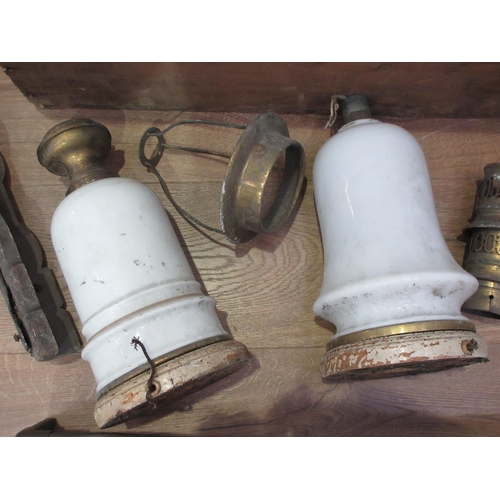 435 - A box containing a gas Wall Light, and pair of Table Lamps, hearth front etc.