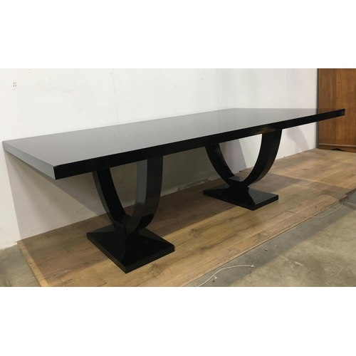 469 - A modern black lacquered Dining Table designed by Jonathan Sainsbury 7ft 6in L x 2ft 7in H