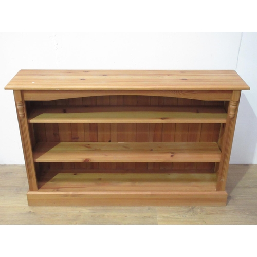 105 - A modern pine Bookcase with adjustable shelves 4ft 6in W x 2ft 10in H