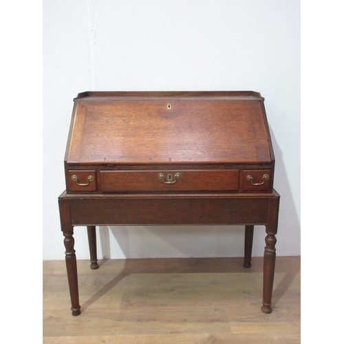 111 - An 18th Century oak slope fronted Bureau on associated stand 3ft 4in H x 2ft 11in W