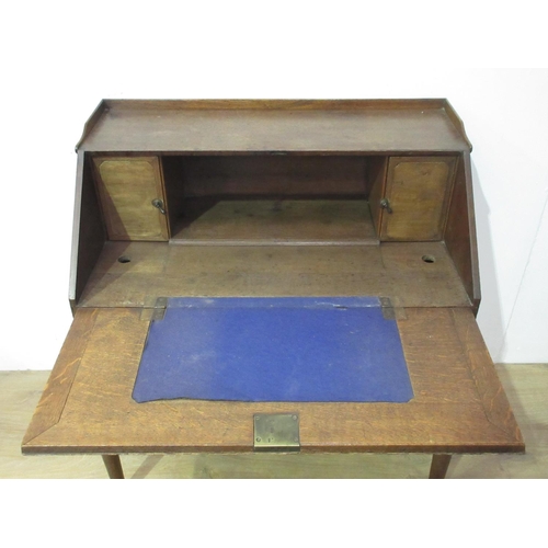 111 - An 18th Century oak slope fronted Bureau on associated stand 3ft 4in H x 2ft 11in W