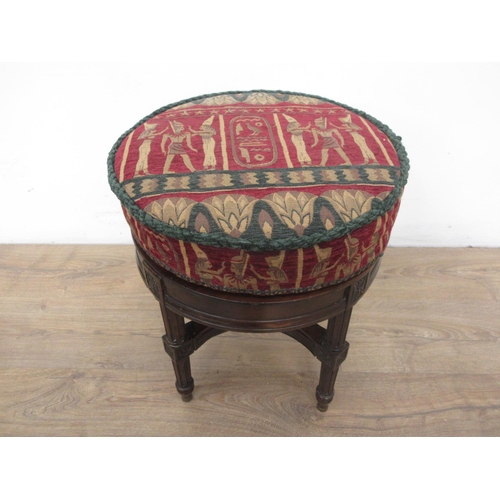 121 - A 19th Century mahogany revolving Piano Stool with Egyptian decorated cushioned seat mounted upon re... 