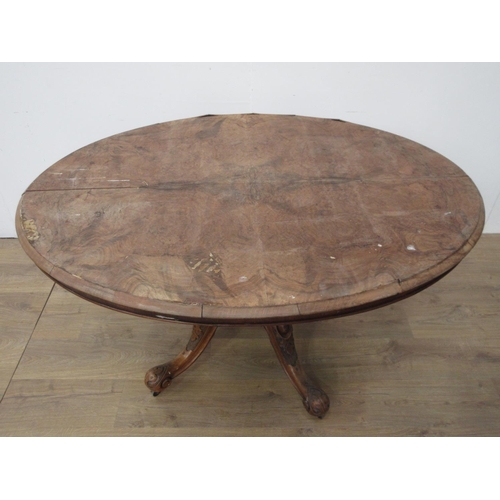 123 - A Victorian walnut veneered oval Breakfast Table on leafage carved supports 4ft 8in W x 2ft 4in H A/... 