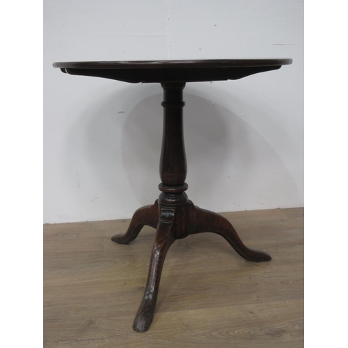 124 - An 18th Century oak Pillar Table on baluster turned column and pad feet 2ft 2in D