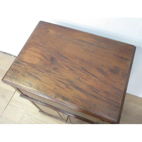 149 - A 19th Century mahogany Cellarette with hinged lid enclosing a compartmentalised metal lined interio... 