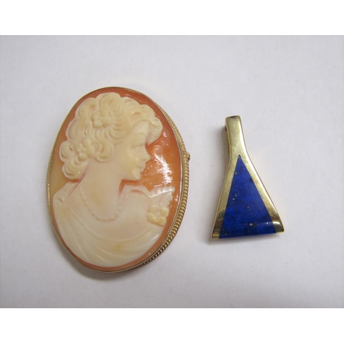 184 - A carved shell Cameo Brooch of bust in profile in 9ct gold frame, and a contemporary Pendant set lap... 