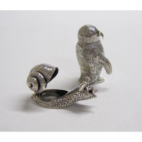 216 - Two modern silver small Models of Penguin and Snail with hinged shell, both stamped STERLING.