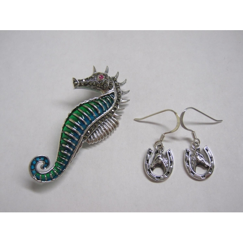 224 - A modern plique-a-jour Brooch of a Seahorse, marked 925 and a pair of Earrings, ends formed as horse... 