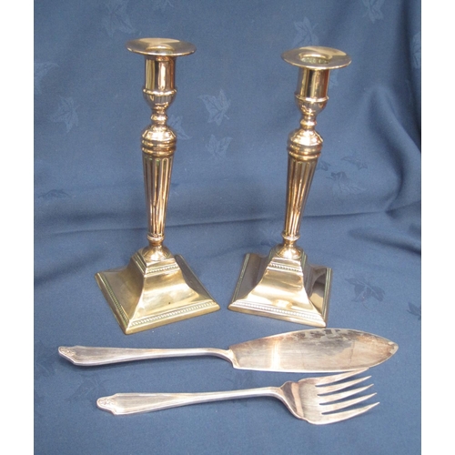 244 - A pair of fluted Candlesticks on square bases, 10 in, and a pair of Servers.