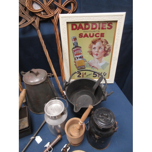 26 - A quantity of kitchen items including two advertising Prints, a railway Butter Churn, two Pestle and... 