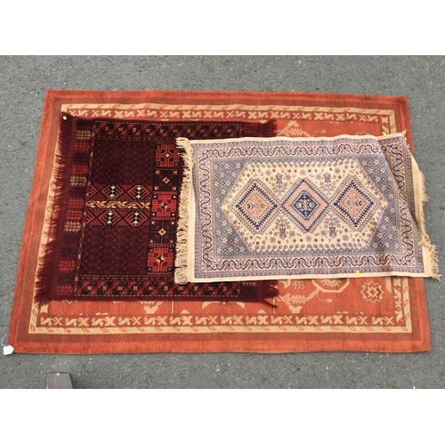 313 - A small Persian Prayer Rug with red ground, 5ft x 3ft 2in, a small Persian Rug and two modern Rugs