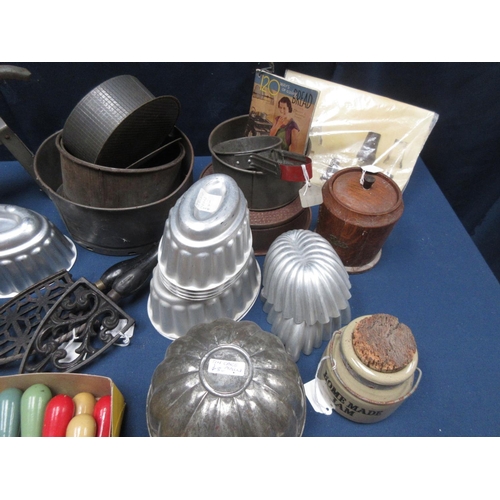 33 - A quantity of Kitchen items including, Cake Tins, Toasting Forks, Can Openers, Jelly Moulds, Can Ope... 