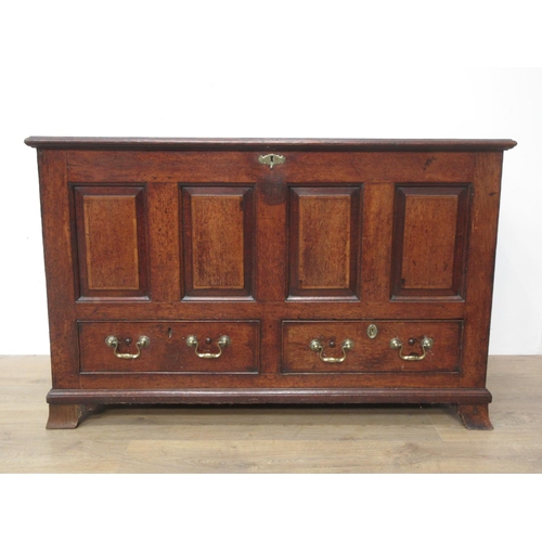 406 - A Georgian oak Mule Chest with two plank moulded lid above four panel front fitted two drawers and m... 